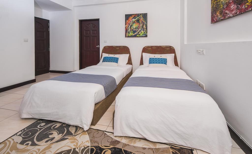 Central Boutique Inn Malé Quarto foto