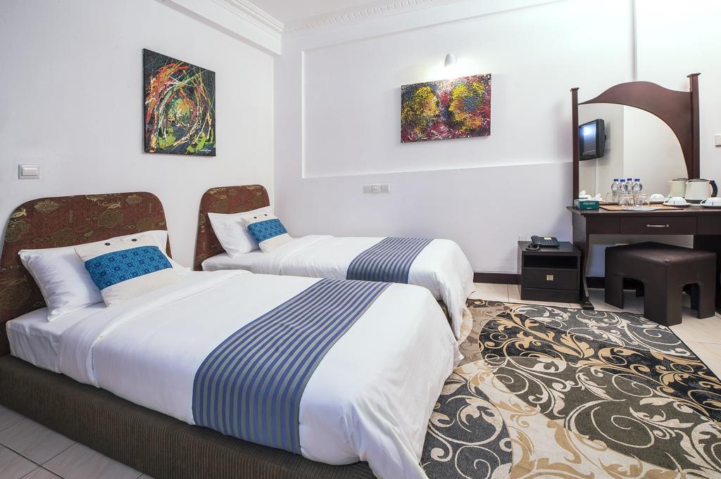 Central Boutique Inn Malé Quarto foto