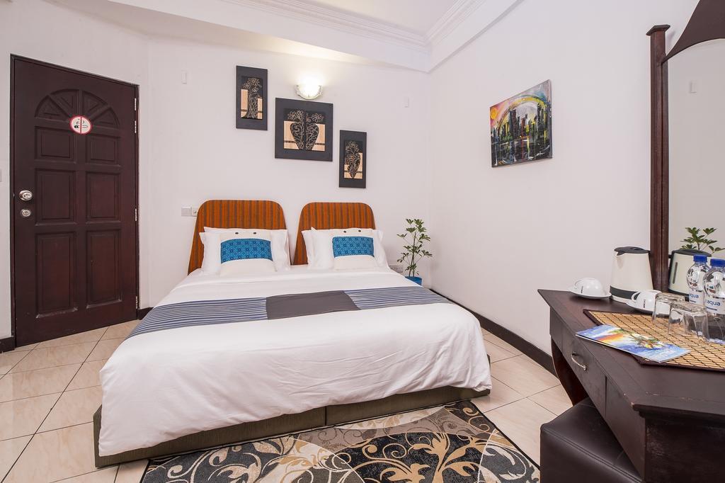 Central Boutique Inn Malé Quarto foto